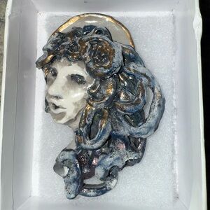 Elegant Silver and Gold Medusa Brooch